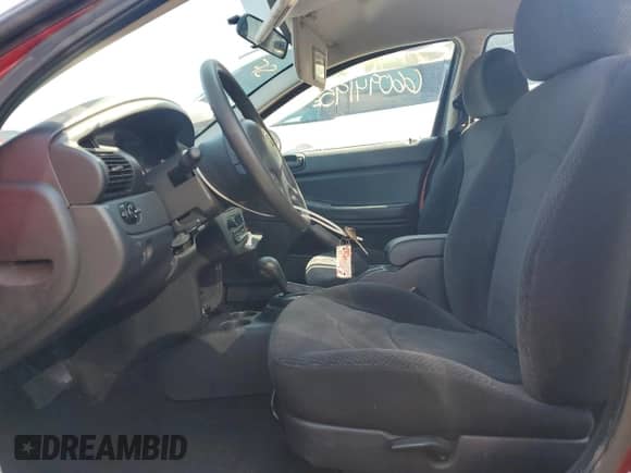 2005 Dodge Stratus SXT with VIN 1B3EL46T75N636383, listed as a Copart auction lot 66094195 with 127,519 mi miles and Salvage title. Bid and sale history available at DreamBid. Image 7.