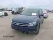 2014 Volkswagen Tiguan S с VIN WVGAV3AX0EW561155, выставлен на аукционе IAAI как лот 41362832 с пробегом 65 399 миль миль и . История ставок и продаж доступна на DreamBid. Изображение 6.