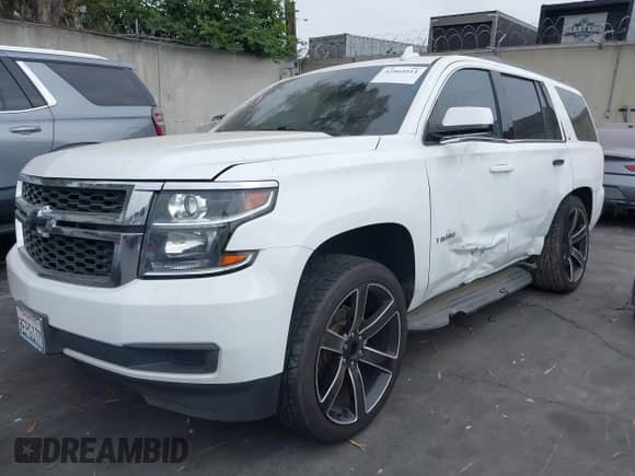 2018 Chevrolet Tahoe LT z VIN 1GNSCBKC1JR206967, wystawiony jako IAAI lot #42565511 z przebiegiem Nie podano mil oraz . Historia ofert i sprzedaży dostępna na DreamBid. Obrazek 19.