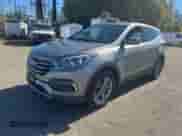 2017 Hyundai Santa Fe 2.4L with VIN 5XYZTDLB2HG405673, listed as a Copart auction lot 89664285 with 156,571 mi miles and Clean title. Bid and sale history available at DreamBid. Image 2.