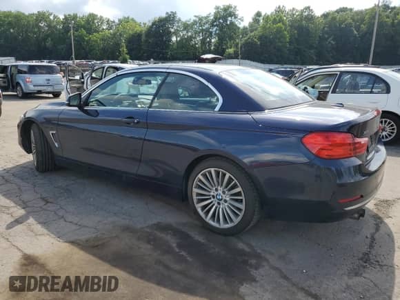 2015 BMW 4 Series 428i xDrive with VIN WBA3T1C56FP820789, listed as a Copart auction lot 65181495 with 63,391 mi miles and Salvage title. Bid and sale history available at DreamBid. Image 2.