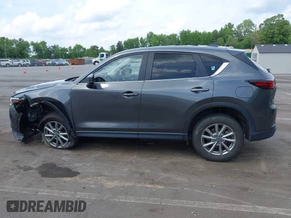 2022 Mazda CX-5 S Carbon Edition с VIN JM3KFBCM2N0629095, выставлен на аукционе IAAI как лот 42177130 с пробегом 28 913 миль миль и . История ставок и продаж доступна на DreamBid. Изображение 14.