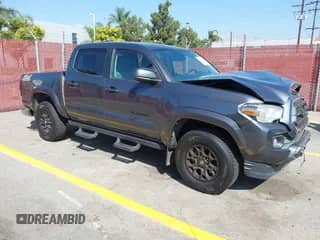 2022 Toyota Tacoma SR5 with VIN 3TMAZ5CN2NM174087, listed as a IAAI auction lot 43204600 with 68,360 mi miles and . Bid and sale history available at DreamBid. Image 1.