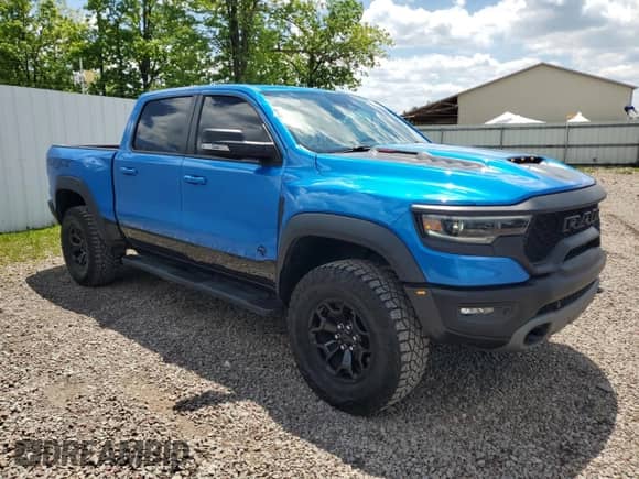 2022 Ram 1500 TRX с VIN 1C6SRFU93NN229879, выставлен на аукционе Copart как лот 58710335 с пробегом 8 047 миль миль и Списание • Salvage title. История ставок и продаж доступна на DreamBid. Изображение 4.