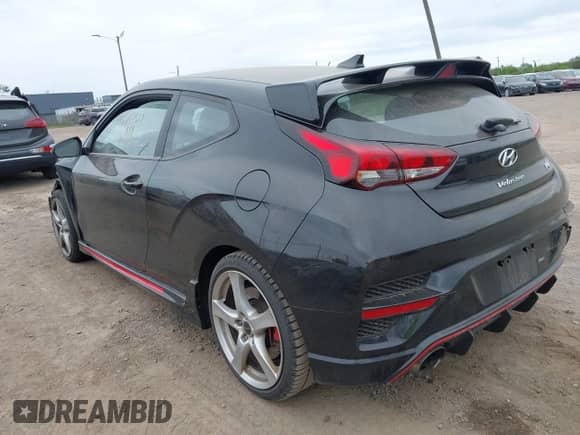 2022 Hyundai Veloster z VIN KMHT36AH0NU015217, wystawiony jako IAAI lot #42297323 z przebiegiem Nie podano mil oraz . Historia ofert i sprzedaży dostępna na DreamBid. Obrazek 3.