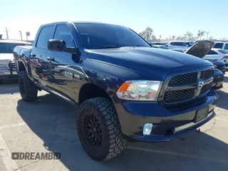2018 Ram 1500 Express z VIN 1C6RR6KT5JS155244, wystawiony jako IAAI lot #41349010 z przebiegiem 118 327 mil mil oraz . Historia ofert i sprzedaży dostępna na DreamBid. Obrazek 1.