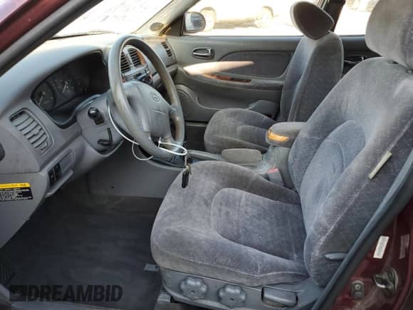 2000 Hyundai Sonata GLS z VIN KMHWF35V5YA259583, wystawiony jako Copart lot #65552755 z przebiegiem 102 922 mil mil oraz Nie do naprawy • Non repairable. Historia ofert i sprzedaży dostępna na DreamBid. Obrazek 7.