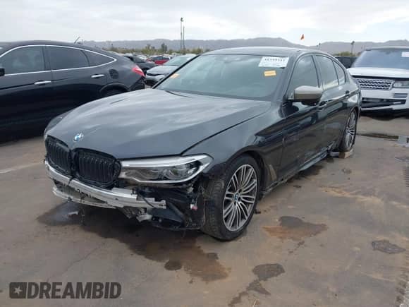 2019 BMW 5 Series M550i xDrive с VIN WBAJB9C51KB287797, выставлен на аукционе IAAI как лот 41549311 с пробегом 61 459 миль миль и . История ставок и продаж доступна на DreamBid. Изображение 6.