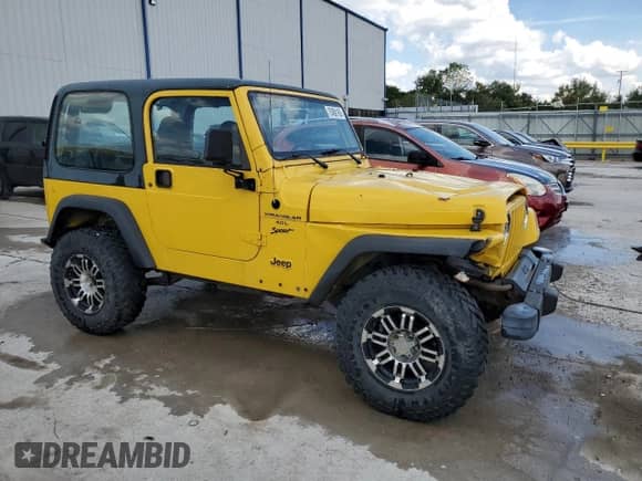 1999 Jeep Wrangler Sport z VIN 1J4FY19S9XP422437, wystawiony jako Copart lot #70458165 z przebiegiem 189 182 mil mil oraz Szkoda całkowita • Salvage title. Historia ofert i sprzedaży dostępna na DreamBid. Obrazek 4.