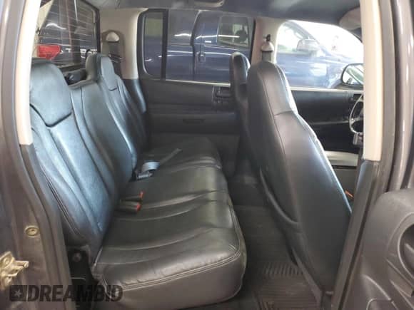2003 Dodge Dakota SLT с VIN 1D7HG48NX3S100353, выставлен на аукционе Copart как лот 71897645 с пробегом 110 269 миль миль и На запчасти • Non repairable. История ставок и продаж доступна на DreamBid. Изображение 10.