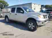 2005 Nissan Frontier Nismo with VIN 1N6AD07W05C431072, listed as a Copart auction lot 70984625 with 204,543 mi miles and Salvage title. Bid and sale history available at DreamBid. Image 4.