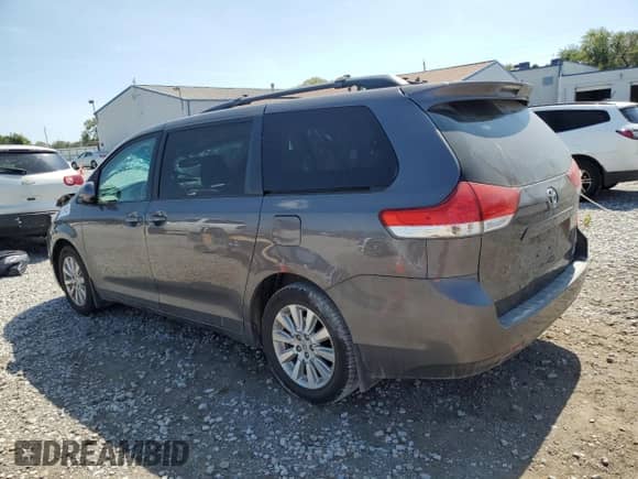 2012 Toyota Sienna LE with VIN 5TDJK3DCXCS037322, listed as a Copart auction lot 80159085 with 192,308 mi miles and Salvage title. Bid and sale history available at DreamBid. Image 2.