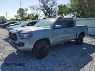 2016 Toyota Tacoma SR5 с VIN 5TFAX5GN9GX056129, выставлен на аукционе Copart как лот 80449155 с пробегом 130 569 миль миль и Списание • Salvage title. История ставок и продаж доступна на DreamBid. Изображение 1.