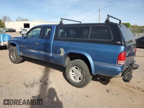 2002 Dodge Dakota Sport с VIN 1B7GG32N52S661020, выставлен на аукционе Copart как лот 54403215 с пробегом 133 284 миль миль и Списание • Salvage title. История ставок и продаж доступна на DreamBid. Изображение 2.