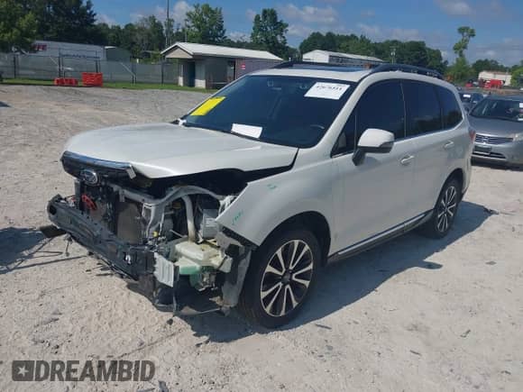 2017 Subaru Forester Touring z VIN JF2SJGWC6HH434017, wystawiony jako IAAI lot #42676511 z przebiegiem 110 981 mil mil oraz . Historia ofert i sprzedaży dostępna na DreamBid. Obrazek 2.