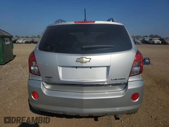 2015 Chevrolet Captiva Sport LT with VIN 3GNAL3EK7FS511382, listed as a Copart auction lot 68749624 with 143,922 mi miles and Salvage title. Bid and sale history available at DreamBid. Image 6.