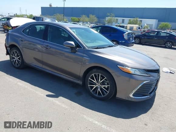 2021 Toyota Camry Hybrid XLE with VIN 4T1F31AK9MU560049, listed as a IAAI auction lot 42211169 with 182,185 mi miles and . Bid and sale history available at DreamBid. Image 1.