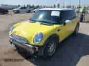 2004 MINI Hardtop with VIN WMWRC33424TJ62339, listed as a IAAI auction lot 43241929 with 147,645 mi miles and . Bid and sale history available at DreamBid. Image 2.