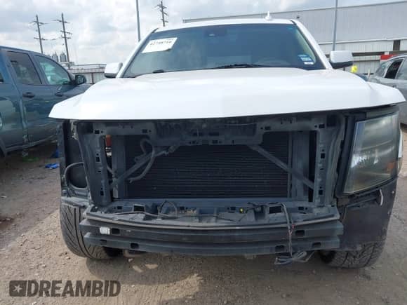 2015 Chevrolet Suburban LT z VIN 1GNSCJKCXFR700715, wystawiony jako IAAI lot #42748716 z przebiegiem 169 082 mil mil oraz . Historia ofert i sprzedaży dostępna na DreamBid. Obrazek 6.