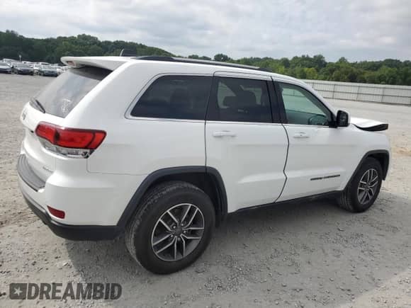 2020 Jeep Grand Cherokee Laredo E with VIN 1C4RJEAG7LC140868, listed as a Copart auction lot 69587565 with 76,879 mi miles and Salvage title. Bid and sale history available at DreamBid. Image 3.
