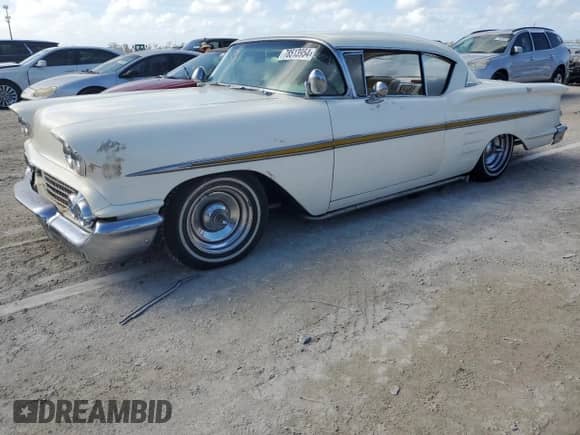 1958 Chevrolet Impala z VIN F58B187676, wystawiony jako Copart lot #78513954 z przebiegiem 15 986 mil mil oraz Szkoda całkowita • Salvage title. Historia ofert i sprzedaży dostępna na DreamBid. Obrazek 1.