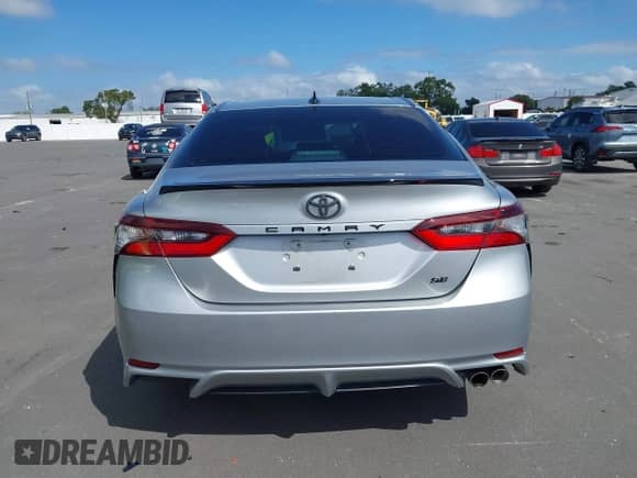2021 Toyota Camry SE with VIN 4T1G11AK2MU445593, listed as a IAAI auction lot 43385464 with 57,907 mi miles and . Bid and sale history available at DreamBid. Image 16.