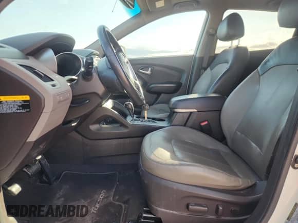 2012 Hyundai Tucson GLS with VIN KM8JU3AC0CU488975, listed as a Copart auction lot 85784175 with 96,884 mi miles and Salvage title. Bid and sale history available at DreamBid. Image 7.