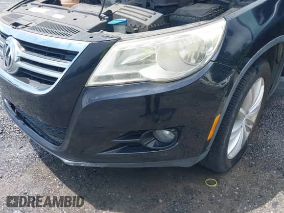 2011 Volkswagen Tiguan S with VIN WVGAV7AX2BW549477, listed as a IAAI auction lot 42923494 with 96,348 mi miles and . Bid and sale history available at DreamBid. Image 6.