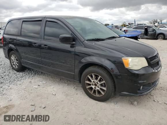 2011 Dodge Grand Caravan R/T with VIN 2D4RN7DG9BR697009, listed as a Copart auction lot 42514555 with 134,949 mi miles and Salvage title. Bid and sale history available at DreamBid. Image 4.