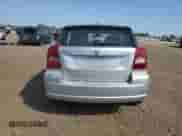 2010 Dodge Caliber Mainstreet with VIN 1B3CB3HA3AD648594, listed as a Copart auction lot 71647135 with 94,206 mi miles and Salvage title. Bid and sale history available at DreamBid. Image 6.