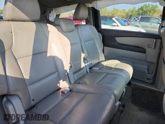 2013 Honda Odyssey EX-L z VIN 5FNRL5H63DB030895, wystawiony jako Copart lot #71099185 z przebiegiem 200 959 mil mil oraz Szkoda całkowita • Salvage title. Historia ofert i sprzedaży dostępna na DreamBid. Obrazek 10.