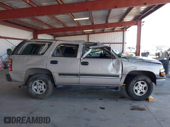 2005 Chevrolet Tahoe LS with VIN 1GNEC13T65J172986, listed as a IAAI auction lot 41449674 with 252,129 mi miles and . Bid and sale history available at DreamBid. Image 12.