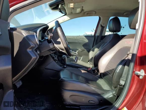 2017 Chevrolet Sonic Premier with VIN 1G1JF6SB1H4125333, listed as a Copart auction lot 80949404 with 85,595 mi miles and Salvage title. Bid and sale history available at DreamBid. Image 7.