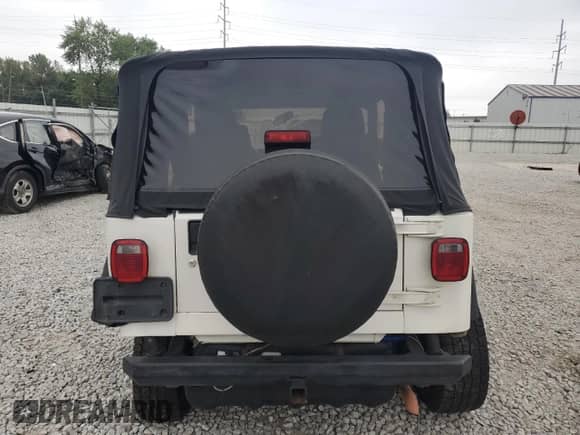 2004 Jeep Wrangler SE with VIN 1J4FA29114P753042, listed as a Copart auction lot 69743975 with Not provided miles and Salvage title. Bid and sale history available at DreamBid. Image 6.