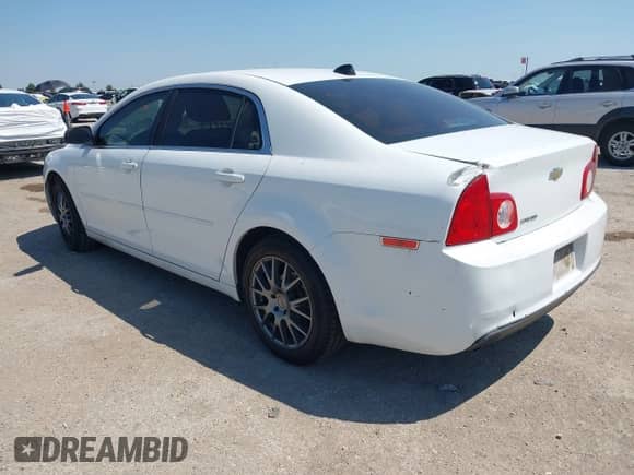 2012 Chevrolet Malibu 1LS z VIN 1G1ZB5E04CF167205, wystawiony jako IAAI lot #43180002 z przebiegiem 165 160 mil mil oraz . Historia ofert i sprzedaży dostępna na DreamBid. Obrazek 3.