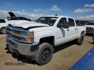 2017 Chevrolet Silverado 2500HD Work Truck with VIN 1GC1KUEG9HF227479, listed as a Copart auction lot 53292695 with 141,692 mi miles and Salvage title. Bid and sale history available at DreamBid. Image 1.