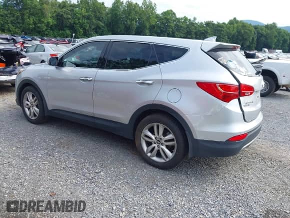 2013 Hyundai Santa Fe Sport z VIN 5XYZWDLA1DG044574, wystawiony jako IAAI lot #42727884 z przebiegiem 168 599 mil mil oraz . Historia ofert i sprzedaży dostępna na DreamBid. Obrazek 3.