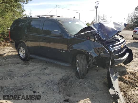 2012 Chevrolet Tahoe LS with VIN 1GNSCAE08CR261494, listed as a Copart auction lot 48569635 with Not provided miles and Salvage title. Bid and sale history available at DreamBid. Image 4.
