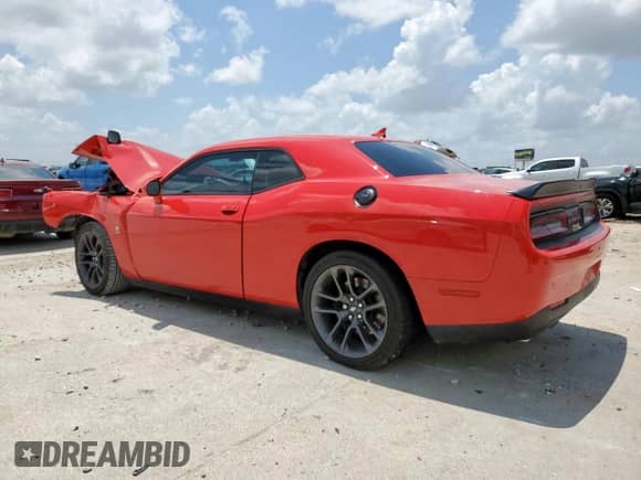 2023 Dodge Challenger R/T Scat Pack with VIN 2C3CDZFJXPH563377, listed as a Copart auction lot 64978125 with 30,167 mi miles and Salvage title. Bid and sale history available at DreamBid. Image 2.