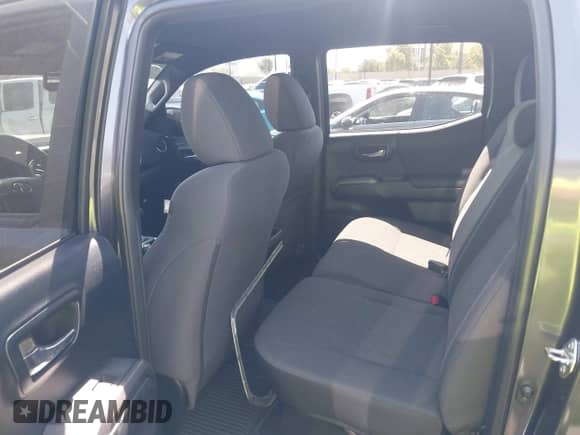 2016 Toyota Tacoma SR5 with VIN 3TMAZ5CNXGM009360, listed as a IAAI auction lot 43186084 with 89,490 mi miles and . Bid and sale history available at DreamBid. Image 8.