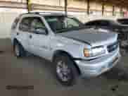 2000 Honda Passport LX with VIN 4S6CK58W6Y4409186, listed as a Copart auction lot 82193655 with 151,884 mi miles and Salvage title. Bid and sale history available at DreamBid. Image 4.