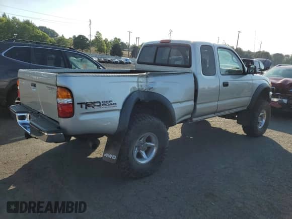 2002 Toyota Tacoma z VIN 5TEWN72NX2Z070220, wystawiony jako Copart lot #81276465 z przebiegiem 143 793 mil mil oraz Szkoda całkowita • Salvage title. Historia ofert i sprzedaży dostępna na DreamBid. Obrazek 3.
