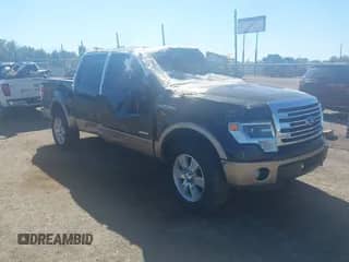 2013 Ford F-150 Lariat with VIN 1FTFW1ET2DKF69640, listed as a IAAI auction lot 43489361 with 184,577 mi miles and . Bid and sale history available at DreamBid. Image 1.