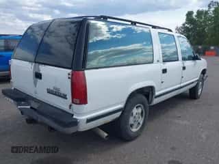 1993 Chevrolet Suburban z VIN 1GNFK16K6PJ397809, wystawiony jako IAAI lot #43161521 z przebiegiem 263 559 mil mil oraz . Historia ofert i sprzedaży dostępna na DreamBid. Obrazek 4.