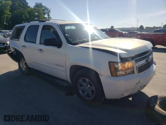2007 Chevrolet Tahoe LS with VIN 1GNFK13077R233943, listed as a Copart auction lot 61080015 with Not provided miles and Salvage title. Bid and sale history available at DreamBid. Image 4.