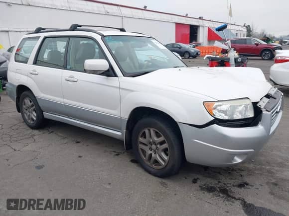 2007 Subaru Forester X L.L. Bean with VIN JF1SG67617H715811, listed as a IAAI auction lot 41332386 with 106,361 mi miles and . Bid and sale history available at DreamBid. Image 1.