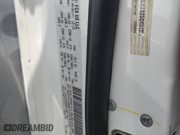 2016 Jeep Compass Latitude z VIN 1C4NJCEB2GD651387, wystawiony jako Copart lot #69041605 z przebiegiem 114 907 mil mil oraz Szkoda całkowita • Salvage title. Historia ofert i sprzedaży dostępna na DreamBid. Obrazek 14.