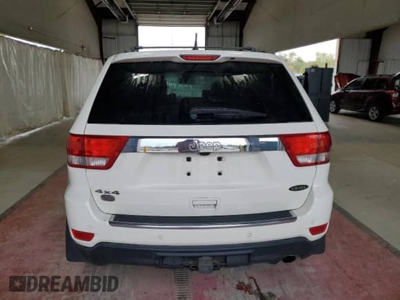 2012 Jeep Grand Cherokee Overland z VIN 1C4RJFCGXCC272414, wystawiony jako Copart lot #80581065 z przebiegiem 135 293 mil mil oraz Szkoda całkowita • Salvage title. Historia ofert i sprzedaży dostępna na DreamBid. Obrazek 6.