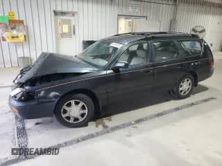 1996 Toyota Camry LE с VIN 4T1EF12K5TU138585, выставлен на аукционе Copart как лот 86094005 с пробегом 154 299 миль миль и Списание • Salvage title. История ставок и продаж доступна на DreamBid. Изображение 1.