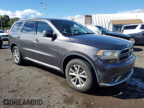 2014 Dodge Durango Limited with VIN 1C4RDHDG7EC557589, listed as a Copart auction lot 84195025 with 134,956 mi miles and Clean title. Bid and sale history available at DreamBid. Image 4.